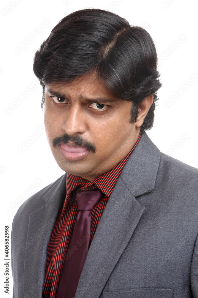 Angry Indian business man on white background. Angry Indian business man on white background.