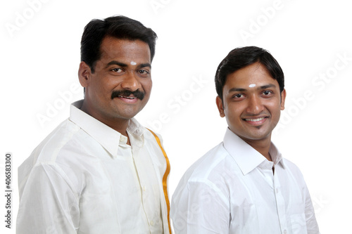 Traditional Indian young people posing to the camera.