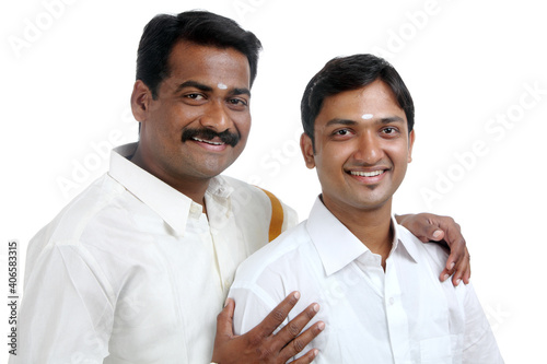 Traditional Indian young people posing to the camera.