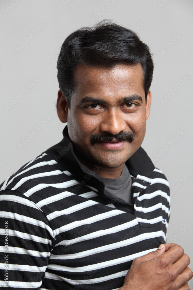 Indian young man posing in casual dress. Indian young man posing in casual dress.
