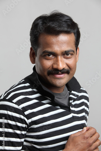 Indian young man posing in casual dress.