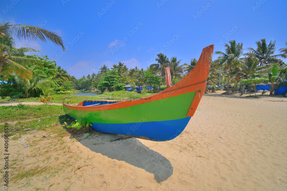A boat kept on marari beach in Kerala.