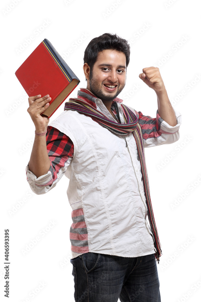 Indian young man with book on white background Indian young man with book on white background