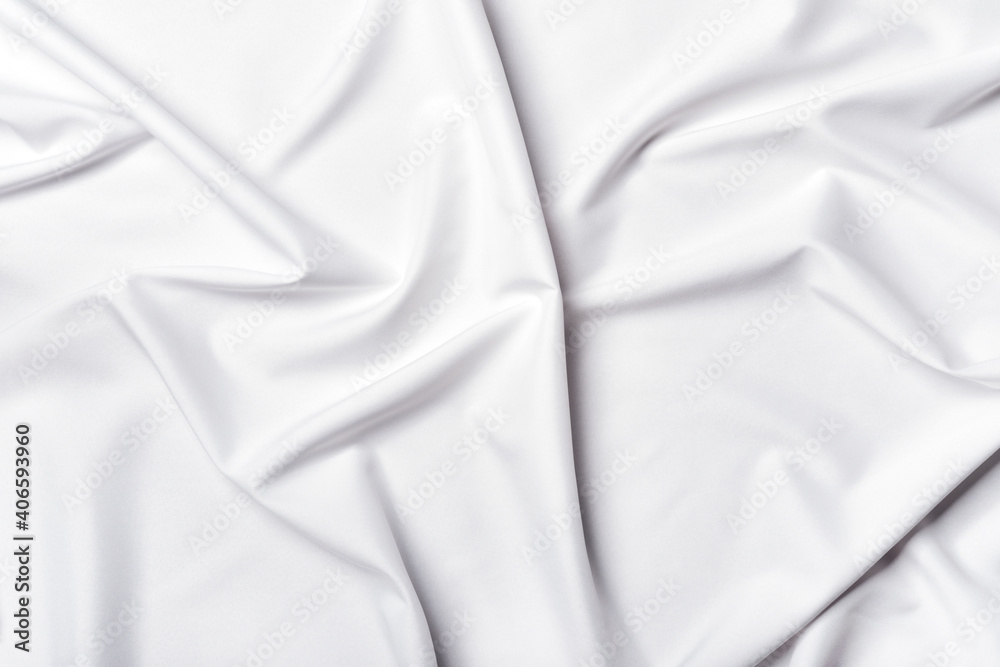Silk satin fabric background. White elegant wavy fabric texture. Abstract background for your design Silk satin fabric background. White elegant wavy fabric texture. Abstract background for your design
