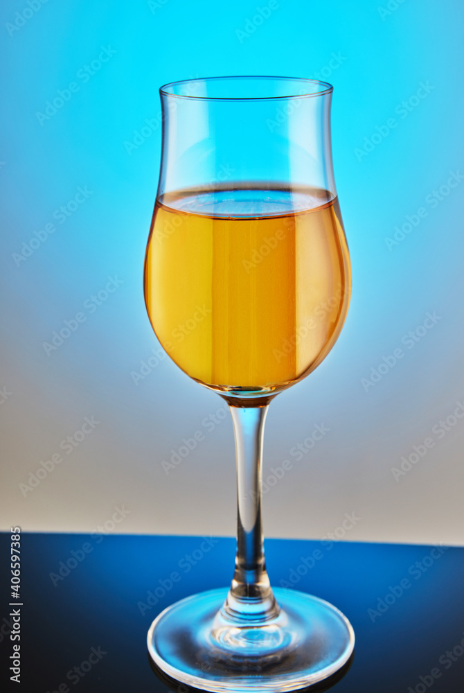 Cognac Elite Superior in a glass with reflection Cognac Elite Superior in a glass with reflection