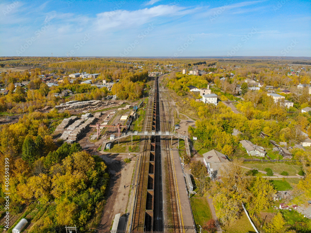 Aerial view of the railway in the village of Falenki in autumn (Kirov region, Russia)