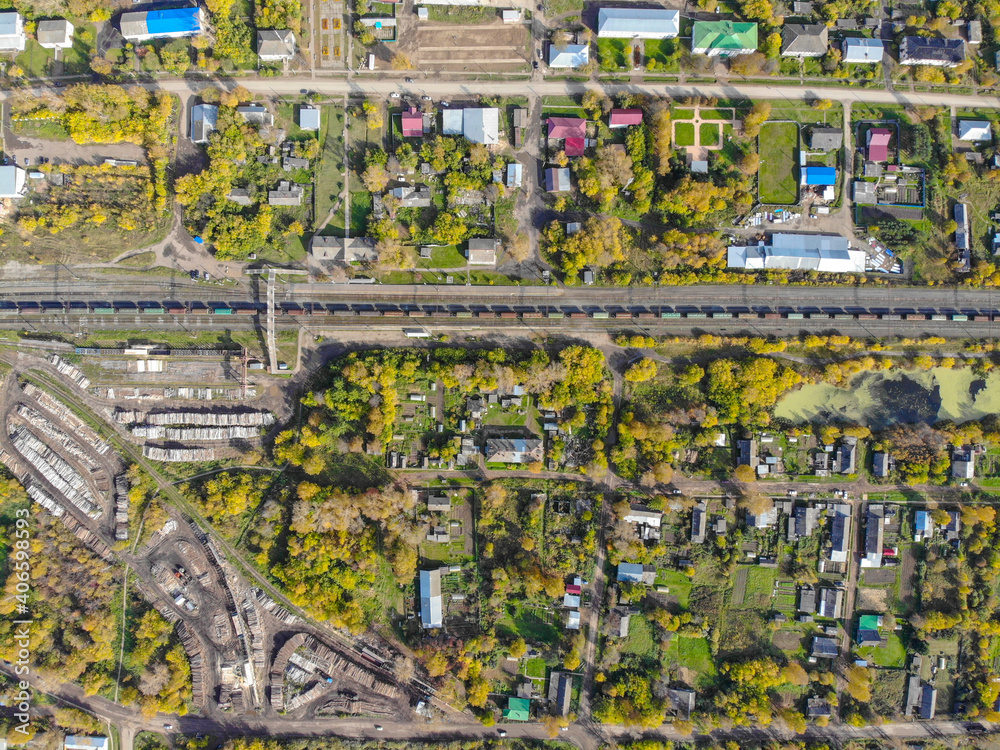 Aerial view of the railway in the village of Falenki in autumn (Kirov region, Russia)