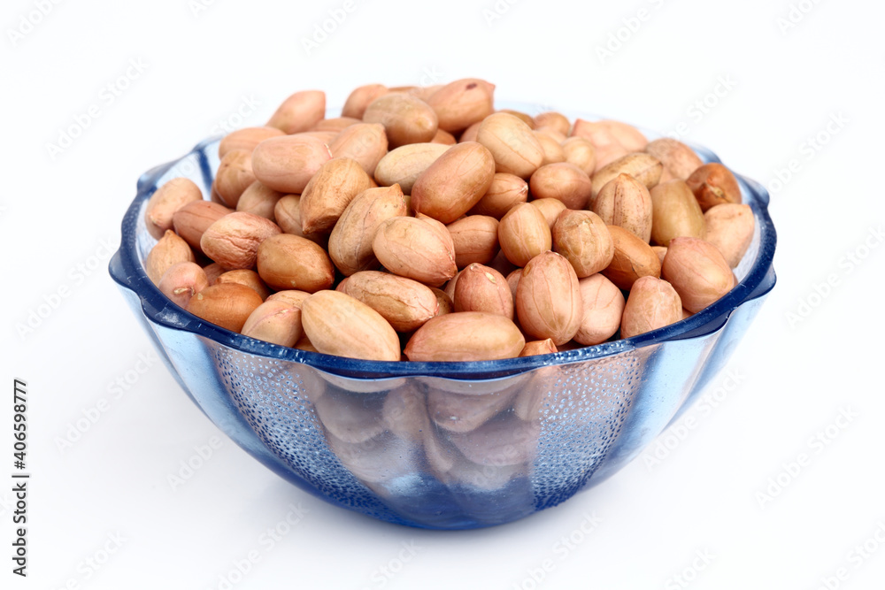 Bowl of peanuts on white. Bowl of peanuts on white.