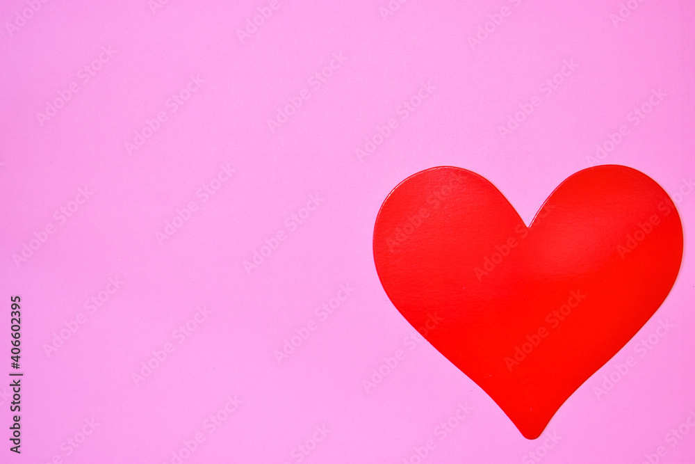 Red heart on a pink background.