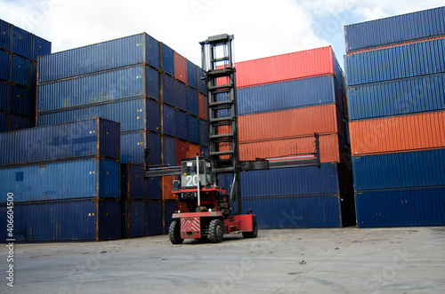 Containers in the port, Shipping Transportation concept and discharging containers services in maritime transports in World wide logistics