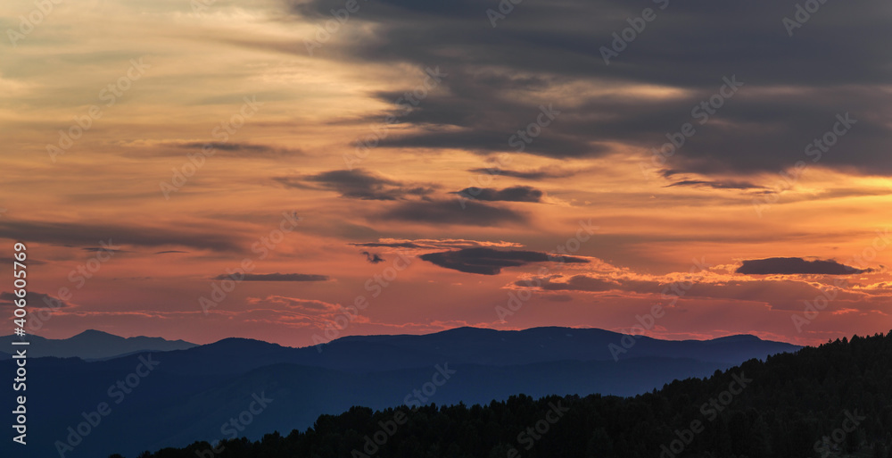 Scenic sunset in the mountains, beautiful clouds