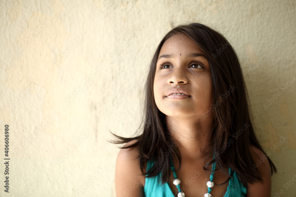 Indian beautiful teen girl posing to camera with smile Indian beautiful teen girl posing to camera with smile