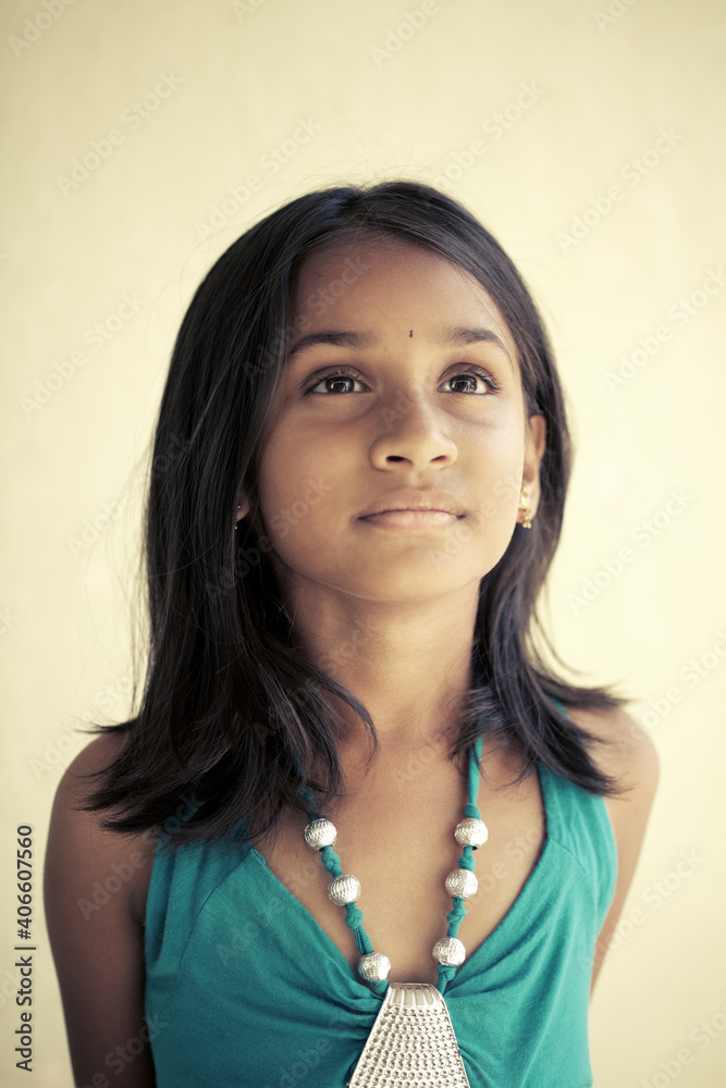 Indian beautiful teen girl posing to camera with smile Indian beautiful teen girl posing to camera with smile