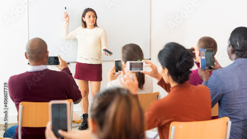 Businesswoman offers to buy goods at business training