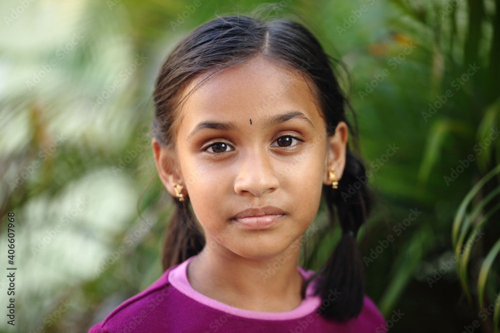 Indian beautiful teen girl posing to camera with smile Indian beautiful teen girl posing to camera with smile