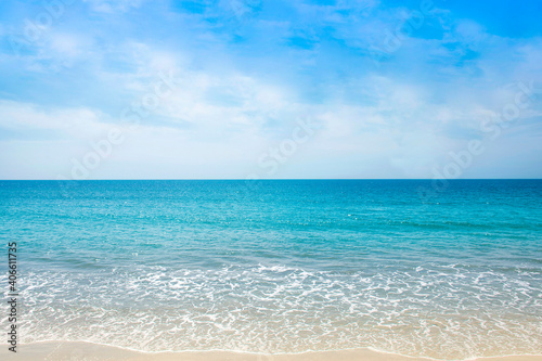 The Scenic beach in a Thailand tropical sea at summer season with a calm waves and blue sky for relax in holiday