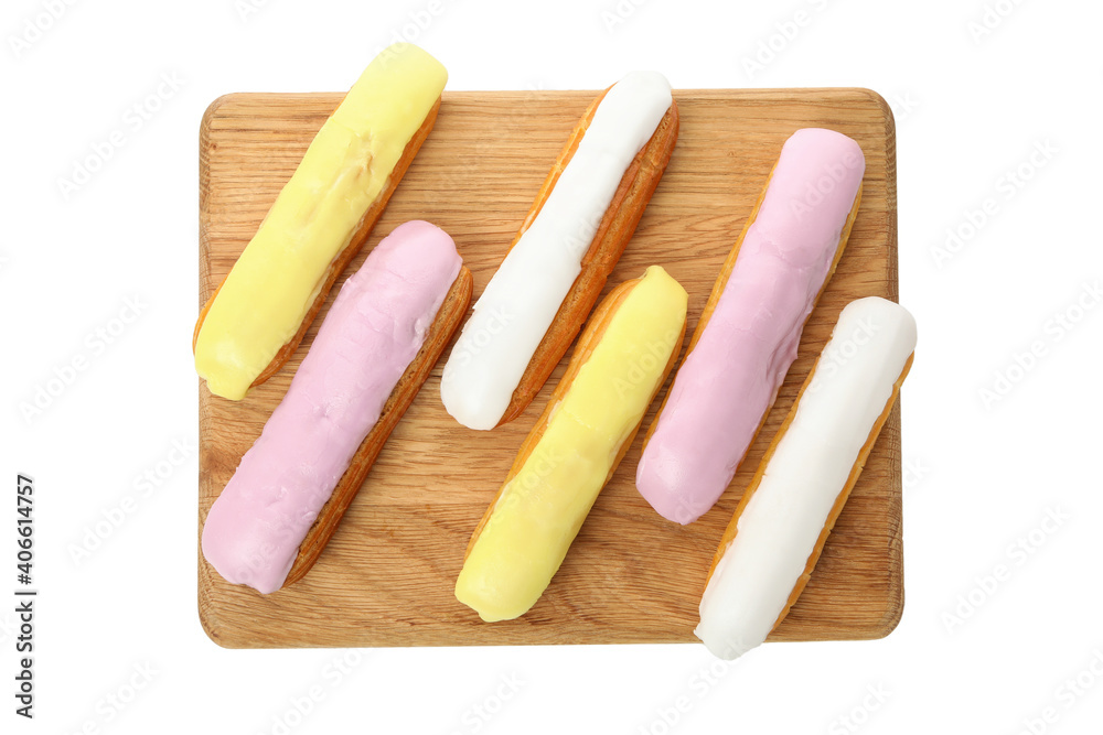 Board with eclairs with custard isolated on white background Board with eclairs with custard isolated on white background