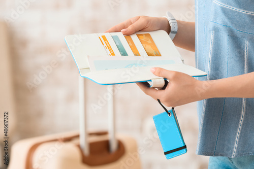 Woman with travel organizer...