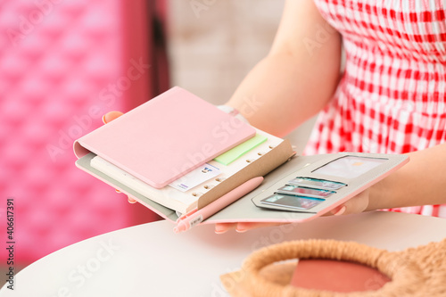 Woman with travel organizer...