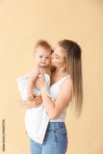 Happy mother with cute litt...
