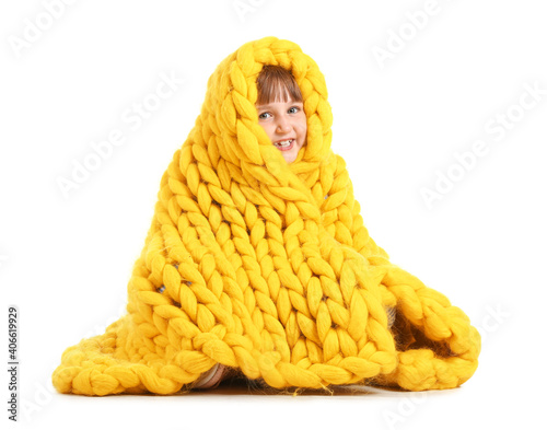 Happy little girl with warm...