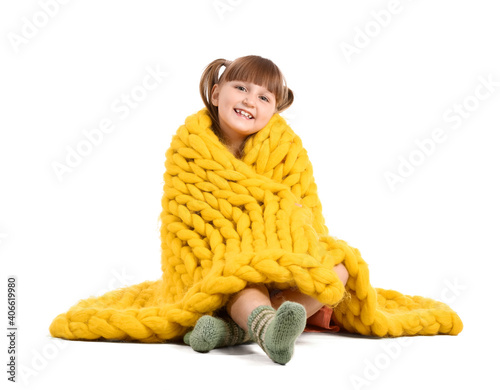 Happy little girl with warm...