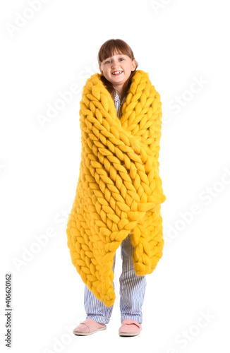 Happy little girl with warm...