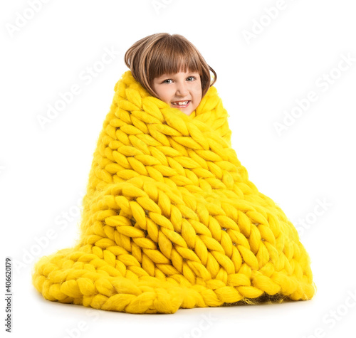 Happy little girl with warm...