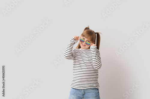 Cute little girl wearing st...