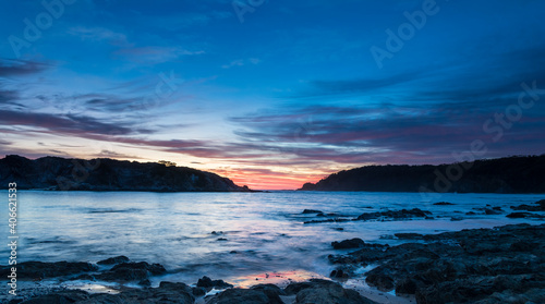 Colourful High Cloud Sunrise Seascape Panorama and Rock Formations