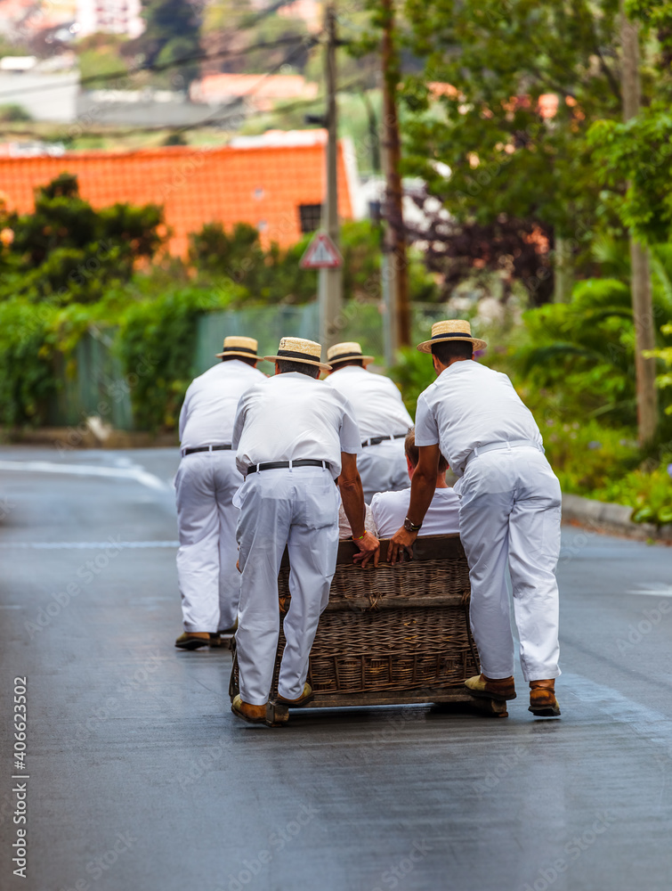 Toboggan riders on sledge in Monte - Funchal Madeira Portugal Toboggan riders on sledge in Monte - Funchal Madeira Portugal