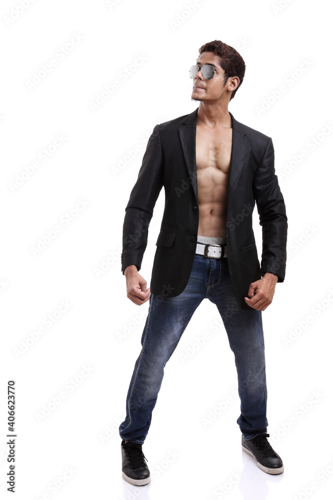 Indian young fitness man posing on white background. Indian young fitness man posing on white background.