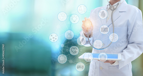 Medical technology network concept. doctor using digital tablet with medical icons and stechoscope at hospital background. copy space.