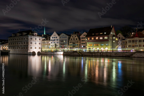 Picturesque night view of town hall and historical buildings on Limmat river quay, Zurich, Switzerland © haidamac