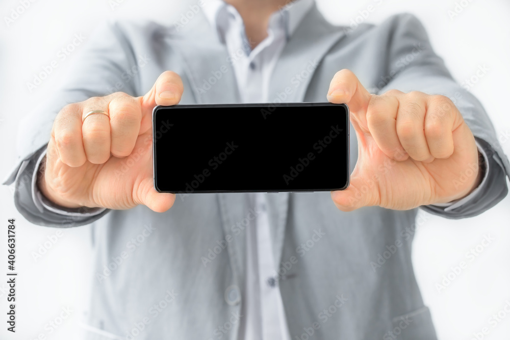 Phone in hands of businessman Phone in hands of businessman