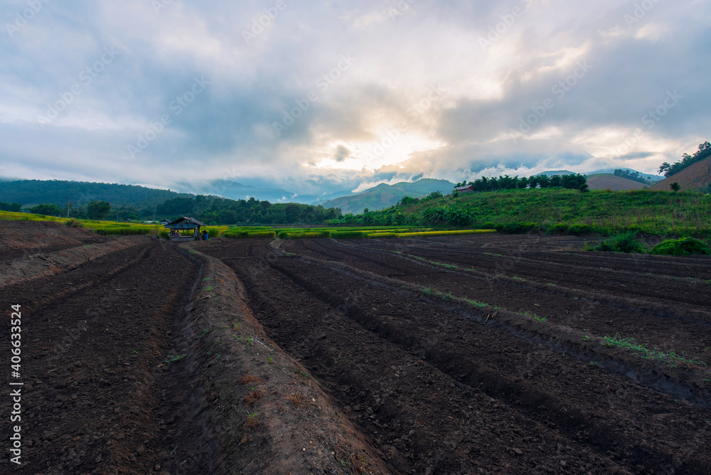 Scenery of agricultural plots ready for cultivation in the new season, located in Mae Chaem, Chiang Mai, Thailand. Scenery of agricultural plots ready for cultivation in the new season, located in Mae Chaem, Chiang Mai, Thailand.