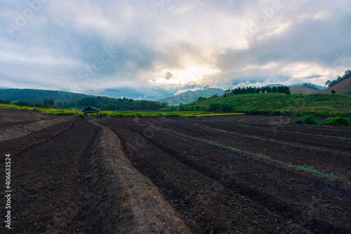 Scenery of agricultural plots ready for cultivation in the new season, located in Mae Chaem, Chiang Mai, Thailand.