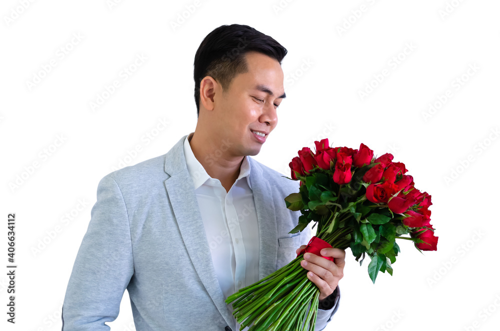 Asian man wearing grey suit holding a bouquet of red roses isolated in white background for anniversary or Valentine's day concept. Asian man wearing grey suit holding a bouquet of red roses isolated in white background for anniversary or Valentine's day concept.