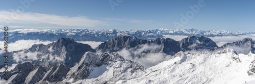 Panorama view of snow mountain in summer from Top of Germany Zugspitze