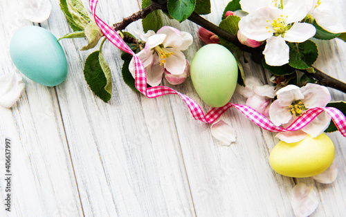 Colorful Easter eggs with spring blossom flowers