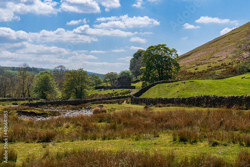 Yorkshire Dales Landscape with the River Rawthey near Low Haygarth, Cumbria, England, UK photo