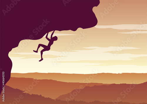 silhouette design of man climbing cliff