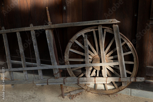 Old machinery and handcrafted wooden objects in the traditional village of Saiko Iyashi no Sato Nemba in Saiko, Yamanshi, Japan photo