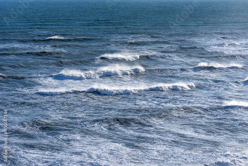 Beautiful winter view of picturesque Atlantic Ocean in Iceland. A waves of the Atlantic Ocean hit the coast of Iceland. The coast of Atlantic Ocean in winter.