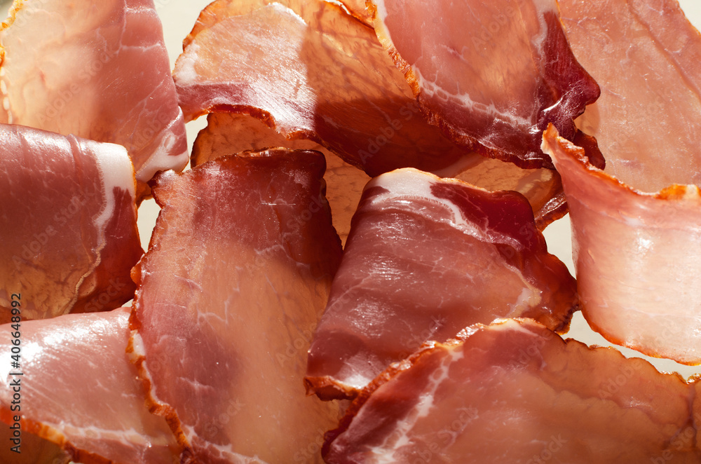 Closeup of texture of cutted pieces of tasty dried meat as a background Closeup of texture of cutted pieces of tasty dried meat as a background
