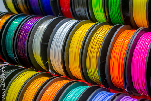 Multicolored filaments of plastic for printing on 3D printer close-up