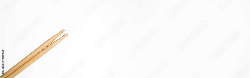 Obraz premium Banner drum sticks on white background, copy space