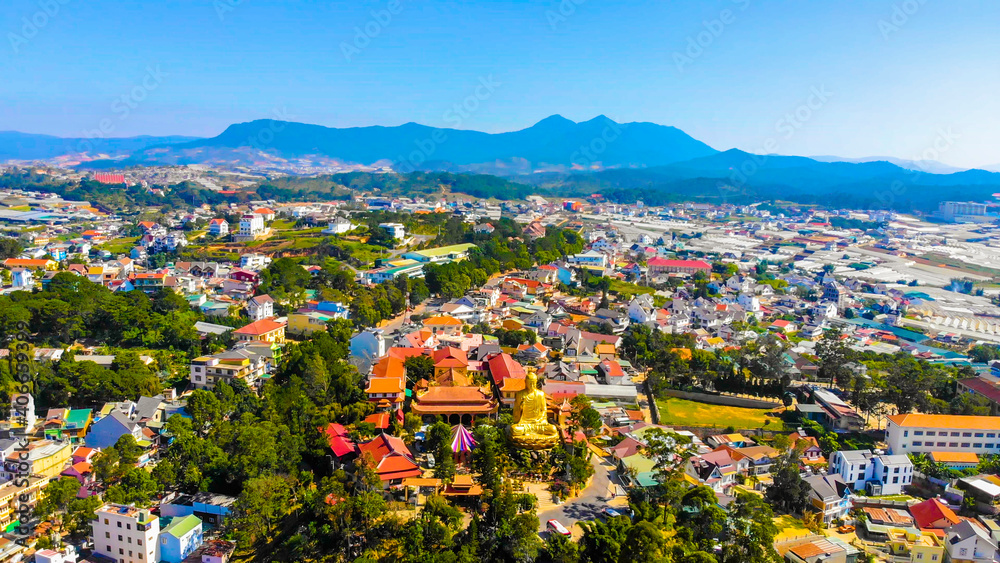 Fototapeta premium Aerial view of The Golden Buddha statue or Thien vien Van Hanh in Dalat city in Vietnam.