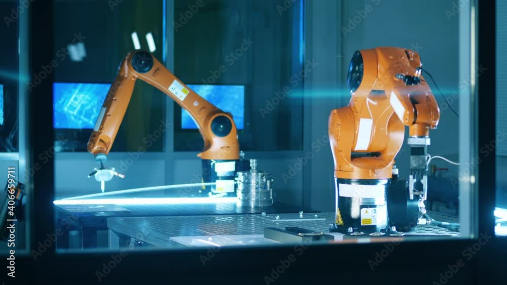 Science lab with two functioning robotic mechanisms