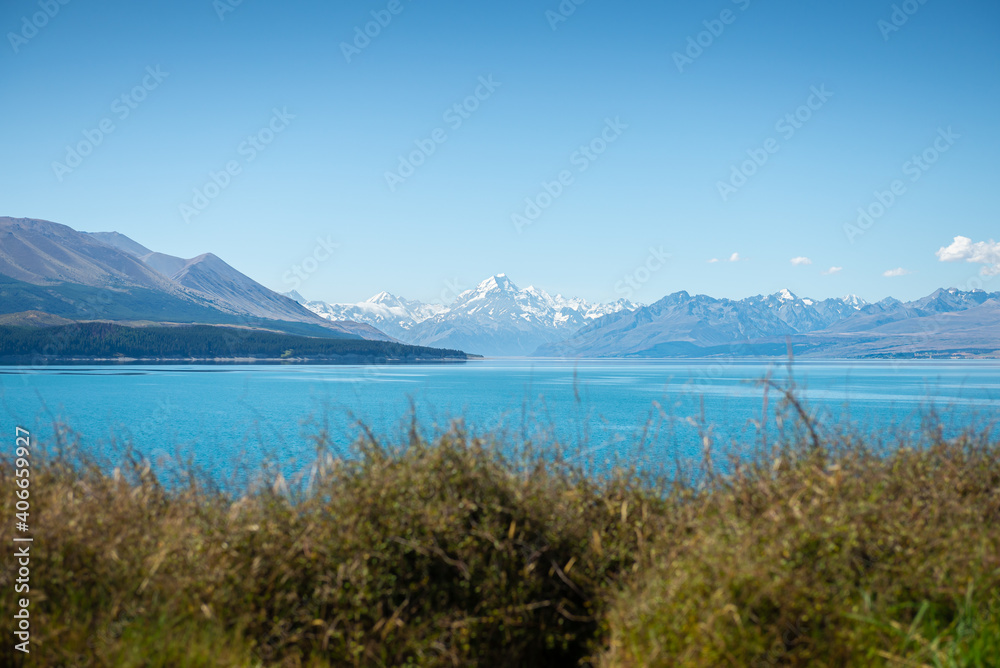 Mount Cook landscape on clear sky day view from  Lake Pukaki, the highest mountain in New Zealand and popular travel destination.